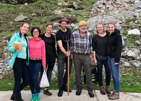 Group of People in Zurich Helping Local Farmers